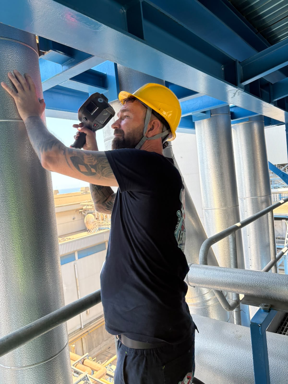 Dennis Jensen carrying out a thermal inspection on industrial pipework